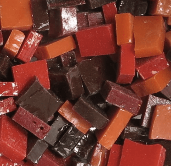 Smalti is specilised mosaic tesserae made from richly coloured glass. Molten glass is poured into flat slabs which are then broken into individual pieces